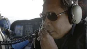 First Admiral Ibrahim in a helicopter looking for the missing tanker 'Sun Birdie.'