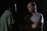A recreation of Bernard talking to a Hatian man.