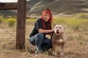 AGUA DULCE, CA - MAY 25TH: Tia Maria Torres poses with one of her personal dogs on ranch land at Torres' Villalobos Rescue Center in Agua Dulce, California, on Tuesday , May 25th, 2010. photo by Stephanie Diani/Getty Images for Discovery Communications