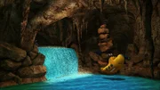 Timmy springt einen unterirdischen Wasserfall hinab.