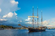 Windjammer on the river Warnow during the Hanse Sail in Rostock, Germany.