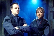 L-R: Dr. Rodney McKay (David Hewlett), Teyla Emmagan (Rachel Luttrell)