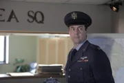 US Air Force Captain (gespielt von einem Schauspieler) im Kartenraum des Weißen Hauses.