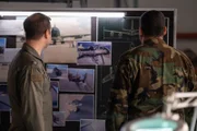 REENACTMENT - Lt. Colonel Ike Stokes (played by Mathieu Bourassa) and another Investigator examine photographs and blueprints of a US Air Force KC-135 to determine why it lost two engines mid-flight during Operation Desert Storm. (Cineflix 2020/Darren Goldstein)