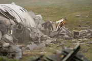 REENACTMENT - William McGrory (played by Benjamin James), a survivor of downed Ansett New Zealand Flight 703 stumbles out of the plane's wreckage. (Cineflix 2020/Darren Goldstein)