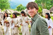Picture Shows_Simon Reeve with members of the Kogi Tribe in the Sierra Nevada Mountains, Colombia - From 'Caribbean with Simon Reeve', first broadcast in 2015 Simon Reeve