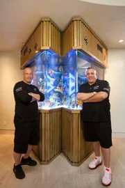 Wayde King and Brett Raymer pose with Marshawn Lynch's Beastmode tank.