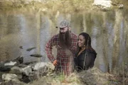 Matt Raney and Chantel Johnson are by the river.