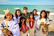 Picture Shows_Simon Reeve with members of the Kogi Tribe on the Caribbean coast of Colombia - From 'Caribbean with Simon Reeve', first broadcast in 2015
