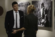 BONES: Booth (David Boreanaz, L) questions a art gallery owner (guest star Annie Fitzgerald, L) about chilling images which depict the victims childhood in Sierra Leone in the "The Survivor in the Soap" episode of BONES airing Monday, March 4 (8:00-9:00 PM ET/PT) on FOX. ©2013 Jordin Althaus/FOX Bones_TheSurvivorInTheSoap_scene18_0052