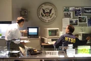 Jack Drake (played by Christopher Sawchyn) reviews the FDR tape with the NTSB engineer.    (Photo Credit: © Cineflix 2009)
