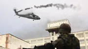 CGI, Fully Commissioned; Rating: 0; Subject: A Marine nearby watches the damaged Black Hawk struggle to stay in the air from the turret of a humvee.