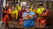 Rip Carlton, Flynn Shaw, Oliver Hoogendorn, James Horner, Cameron Meyer, Devon Davis, Steve Salzar and Kyle Karvia pose with king crab