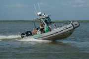 Laredo, TX: Customs and Border Protection agents patrolling the waterways in Laredo.