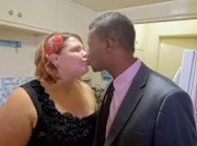 Couple Lyric and Michelle kiss before heading to the Butterfly Lounge, where they met. For over a decade, the Butterfly Lounge has tapped into a previously ignored demographic, by being the first size acceptance night club in America.