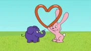 Hase und Elefant basteln ein Herz.
