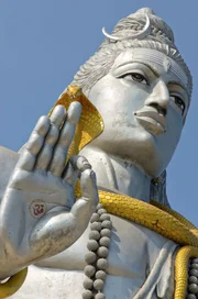 "Big statue of Hindu god Shiva on the coast Arabian sea in Murudeshwara, Karnataka, India." Figure of Lord Shiva in Murudeshwara