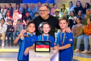 Das blaue Rateteam aus Freilassing/Deutschland kann nach den spannenden Quizrunden stolz die "1, 2 oder 3"-Teilnahmemedaillen präsentieren.