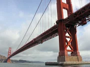 The entire weight of the Golden Gate Bridge is supported by the sweeping cables strung across the two towers.