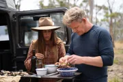 Forestier Peninsula, Tasmania - Gordon Ramsay (R) and local adventurer, Sarah Glover, prep fresh samphire, native cherries and pepperberry before cooking lean wallaby meat. (Credit: National Geographic/Justin Mandel)