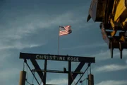 The Christine Rose and American flag.