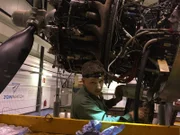 Michael Manousakis and his mechanics working on a 70-year-old Douglas DC-3.
