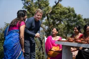 Coorg, India - L to R: Chef Shri Bala and Gordon Ramsay receive feedback on their dishes from guests. (Credit: National Geographic/Justin Mandel)