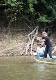 Rewa, Guyana - Gordon Ramsay (R) fishing for black piranha on the Rewa River with Rovin Alvin, an Amerindian fishing guide. (Credit: National Geographic/Justin Mandel)