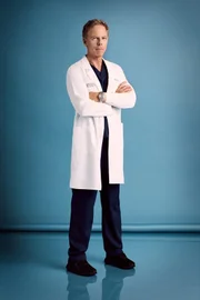 Dr. Thomas Koracick (Greg Germann)