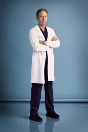 Dr. Thomas Koracick (Greg Germann)