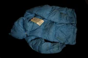 A blue nylon jacket belonging to Maine West sophomore Robert Piest was found in John Wayne Gacy's home.