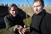 Ludvig Pampehl Dufay and Andreas Ohlsson (Archer) with the head of a replica arrow found at Sandby Borg