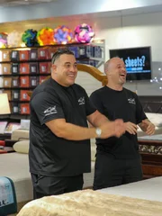 Brett and Wayde listening to their Holy Sheets clients during the tank installation.