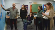 Jackson discussing a map with a volunteer group.