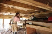 Mars Hill, NC, USA: Tony and Amelia clear out items from under their house. (Photo Credit: National Geographic Television/Lindsay Cooper)