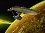 The USS Enterprise passing the planet Mudd (or The Robot Planet), an uninhabited K class planet. This was the home world of the Mudd androids. From episode, 'I, Mudd,' of STAR TREK: THE ORIGINAL SERIES. Original air date, November 3, 1967. Image is a screen grab.