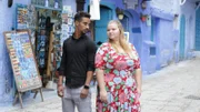 Nicole and Azan pose in the Blue City.