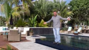Lucas Congdon standing in front of the Chaffees family's new infinity edge spa and pool