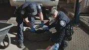 CBP officers cut open a spare tire to find meth. (National Geographic)