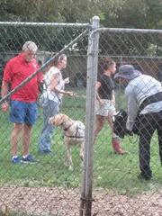Rick, M2, Tia are filmed with Rick's personal dog.