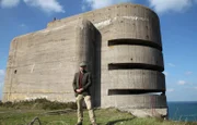 ALDERNEY, CHANNEL ISLANDS - Contributor Tony Pollard standing in front of the MP3 tower.  (photo credit:  DSP)
