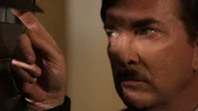 Adolf Hitler peaking out the window.