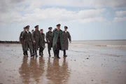 Rommel with his aides surveying the beach and issuing his orders.