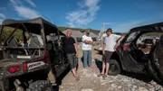 Andy Kelly, Kris Kelly, and Brad Kelly at camp with tents and RZRs.