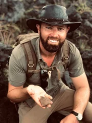 Forrest Galante Smiling Holding Tortuga