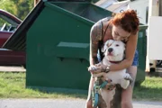 Mariah gives a kiss on Cardigan’s head.