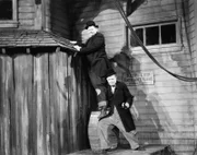 Ollie (Oliver Hardy, l.); Stan (Stan Laurel, r.)