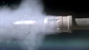 Close up of the bullet firing from a rifle.