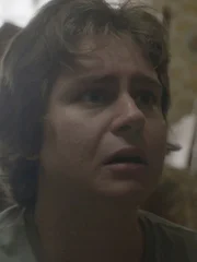 Young man with fearful expression.