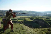 Ein Reenactor feuert eine Muskete in der Zitadelle von Belfort, Frankreich. Die ikonische Stätte spielte eine wichtige Rolle im Deutsch-Französischen Krieg. (National Geographic/Ciaran Henry)